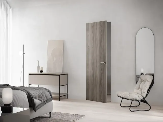 Porta battente filo muro o tradizionale? Differenze e consigli